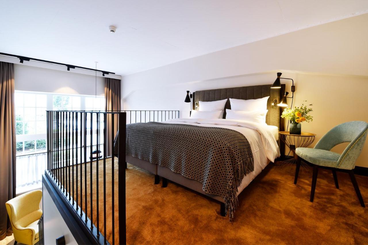 Das James Flensburg Dış mekan fotoğraf A bedroom at the hotel